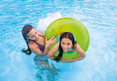 Intex swim tubes in use with a child for buoyant pool fun