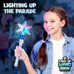 IPIDIPI TOYS Snowflake Wand in a child’s hands for magical playtime.