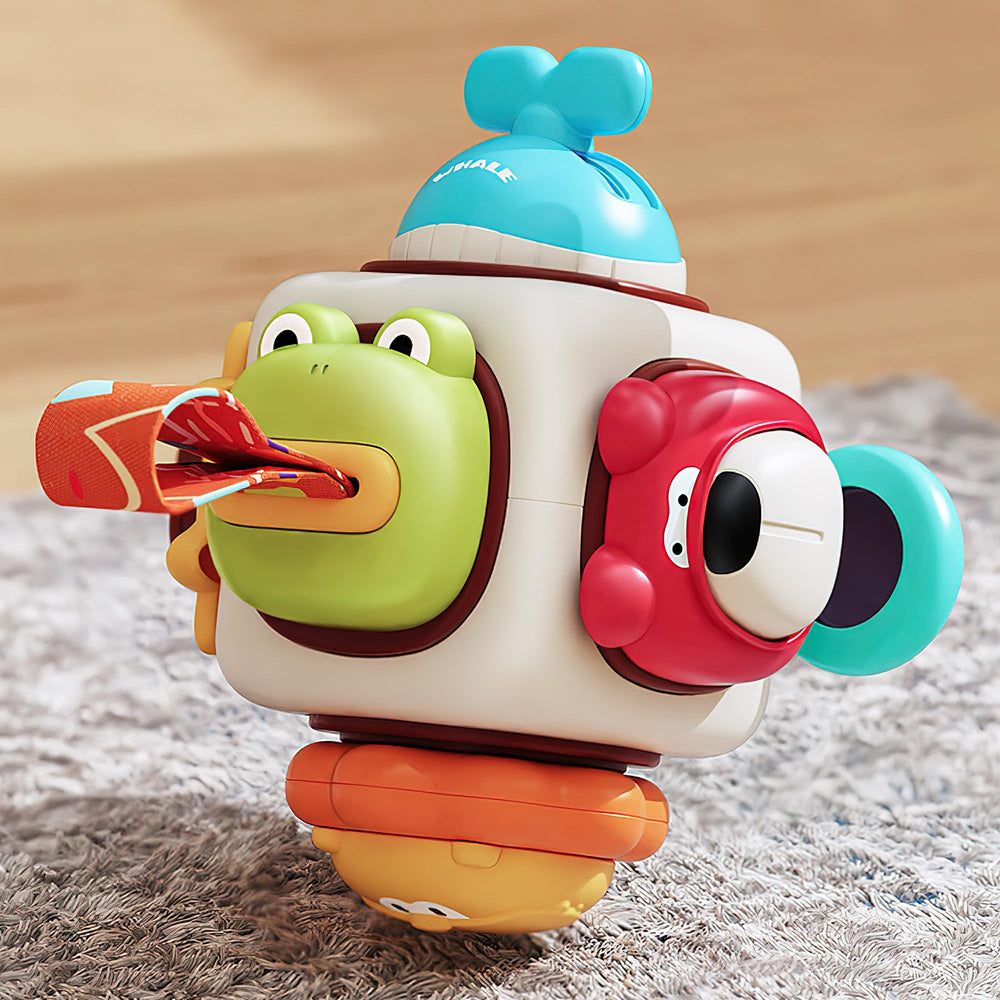 iplay 6in1 busy board cube featuring swinging whale tail to spark motor play