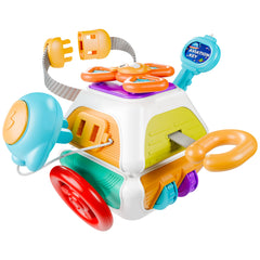 iPlay iLearn spinner toy on Busy Board Cube aids fine motor exploration