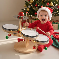 iPlay iLearn sturdy base supporting energetic toddler drumming.