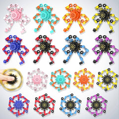 Irvotbes Stackable Spinners enable shared play and creative problem solving.