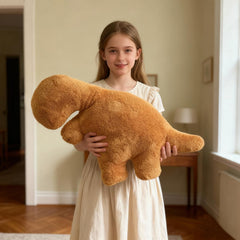 Isaacalyx Dino Nugget Pillow close up shows soft plush and cuteness