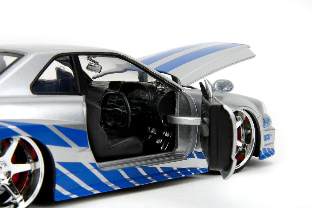 Jada Chrome accents on the R34 add realism and shelf appeal.