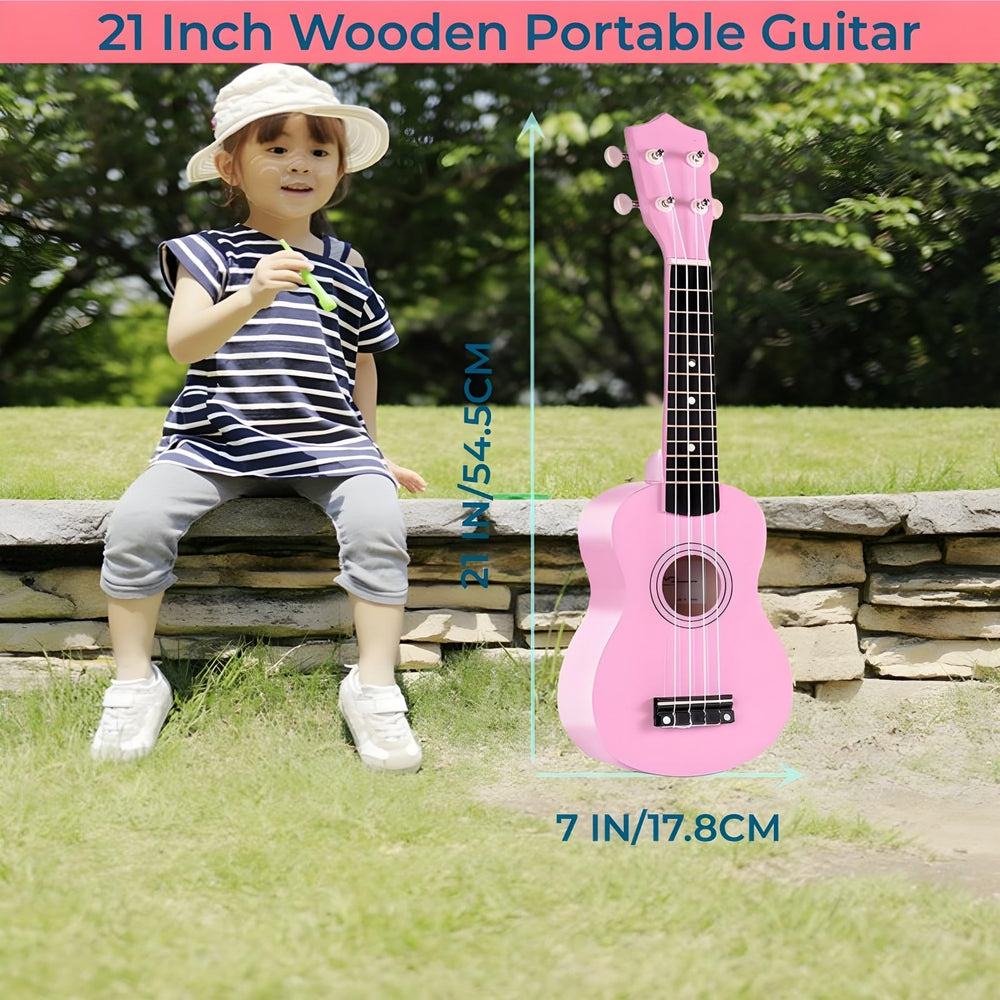 Jakeloo kid holding the guitar, ideal for early music exploration.
