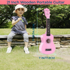 Jakeloo kid holding the guitar, ideal for early music exploration.