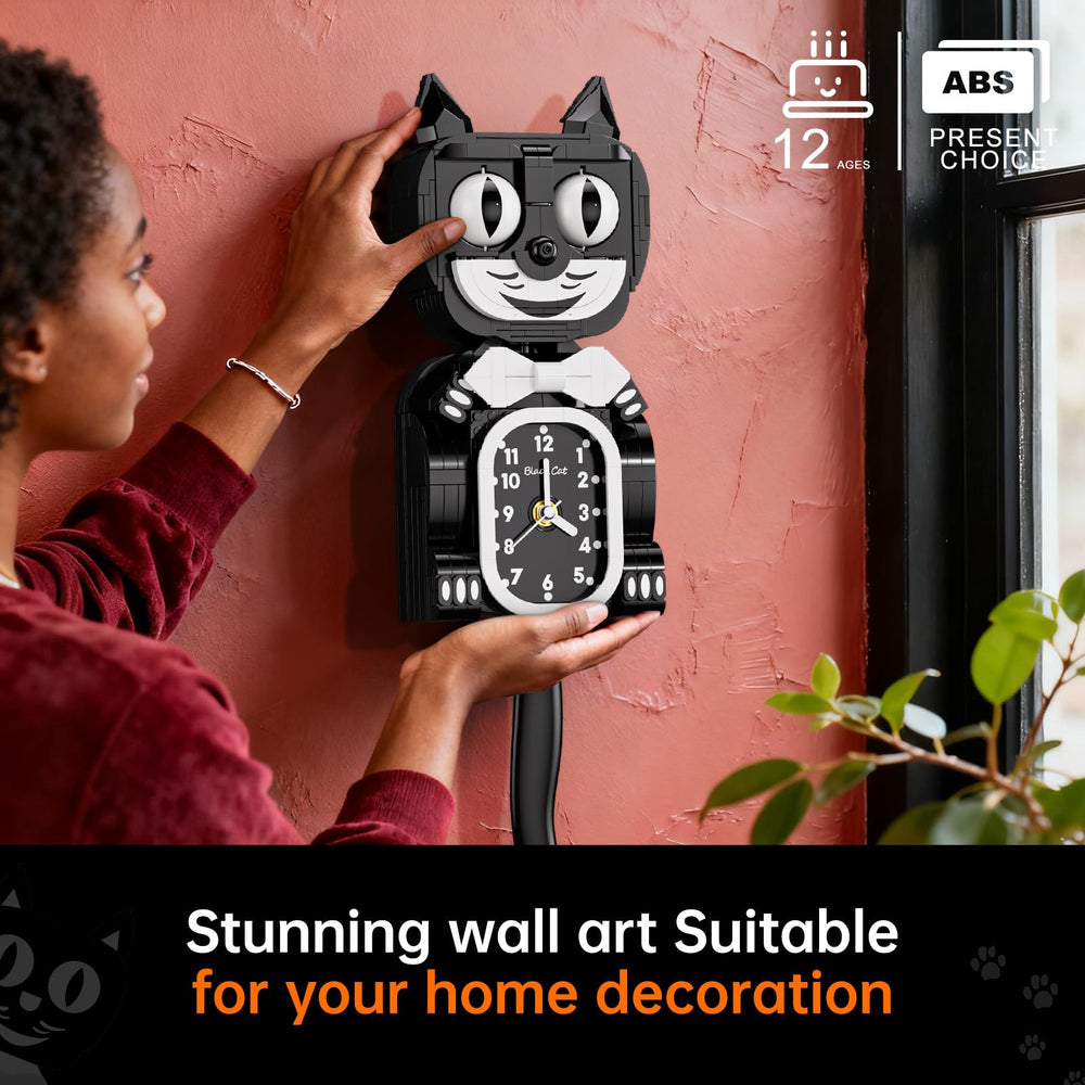 JAKI black cat swing clock moving eyes detail for whimsical decor