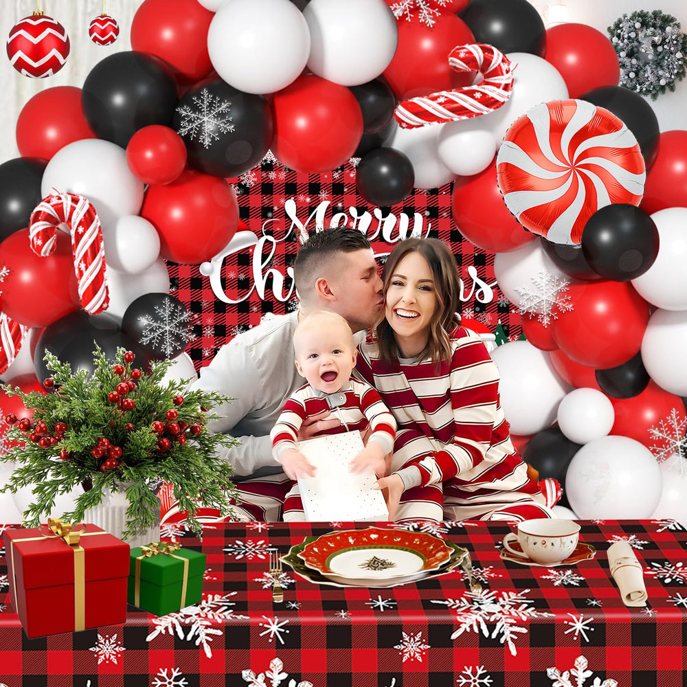 Janinus Christmas party photo booth setup enhances memories with a playful backdrop.