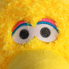 Jay Franco Big Bird pillow buddy in a cozy bedroom setup.