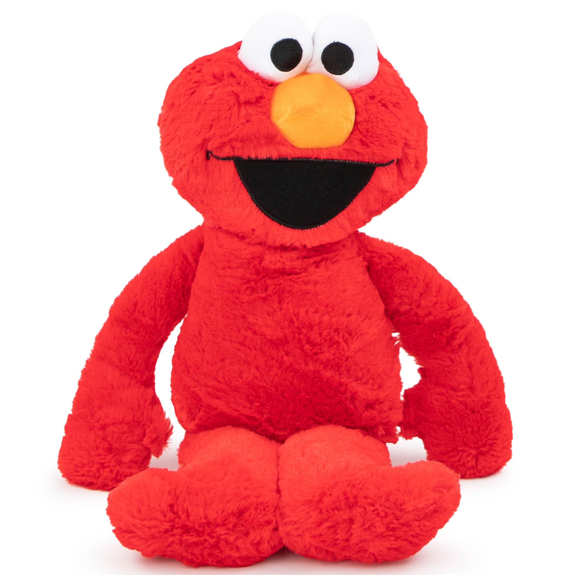 Jay Franco Elmo pillow buddy resting during car ride for comfort.