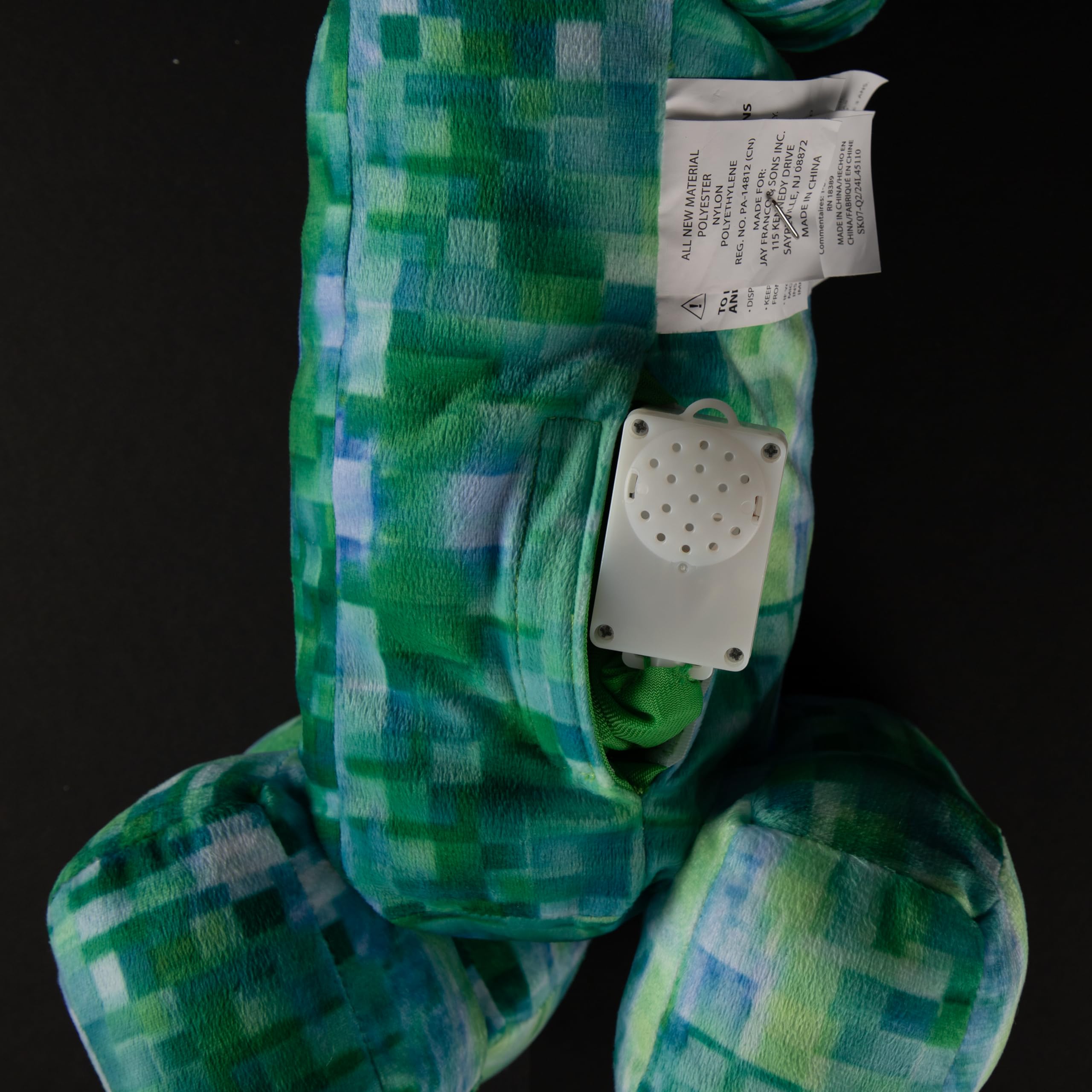 Creeper pillow resting on a bed, ideal for bedtime comfort