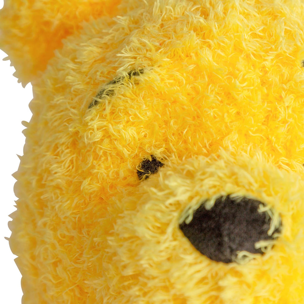 Pooh plush used during travel for on-the-go comforting moments.