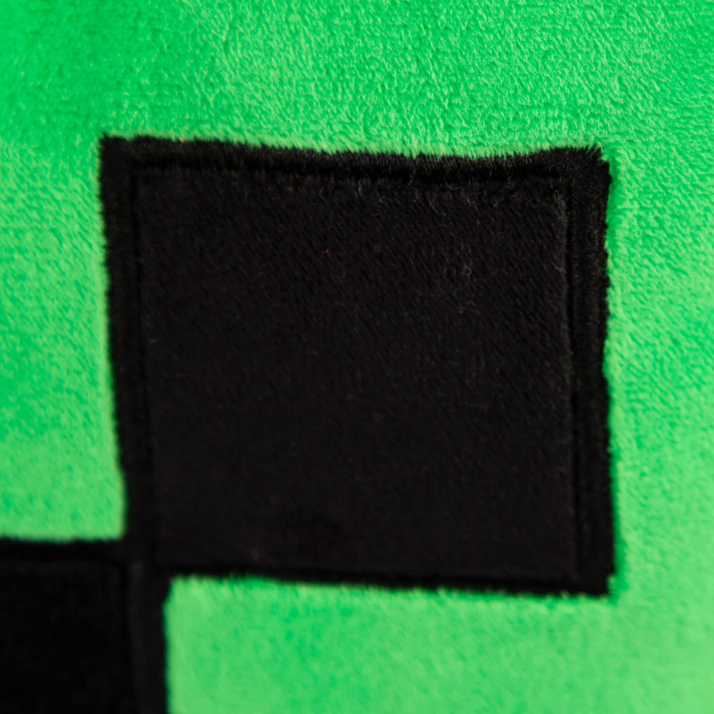 Jay Franco Creeper pillow enhances room decor with Minecraft charm.
