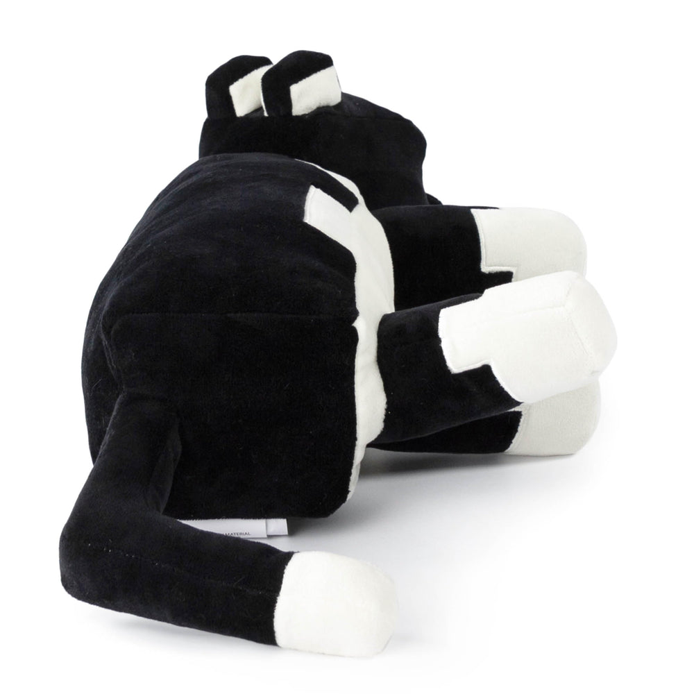 Child using Jay Franco Minecraft tuxedo cat pillow buddy in car ride
