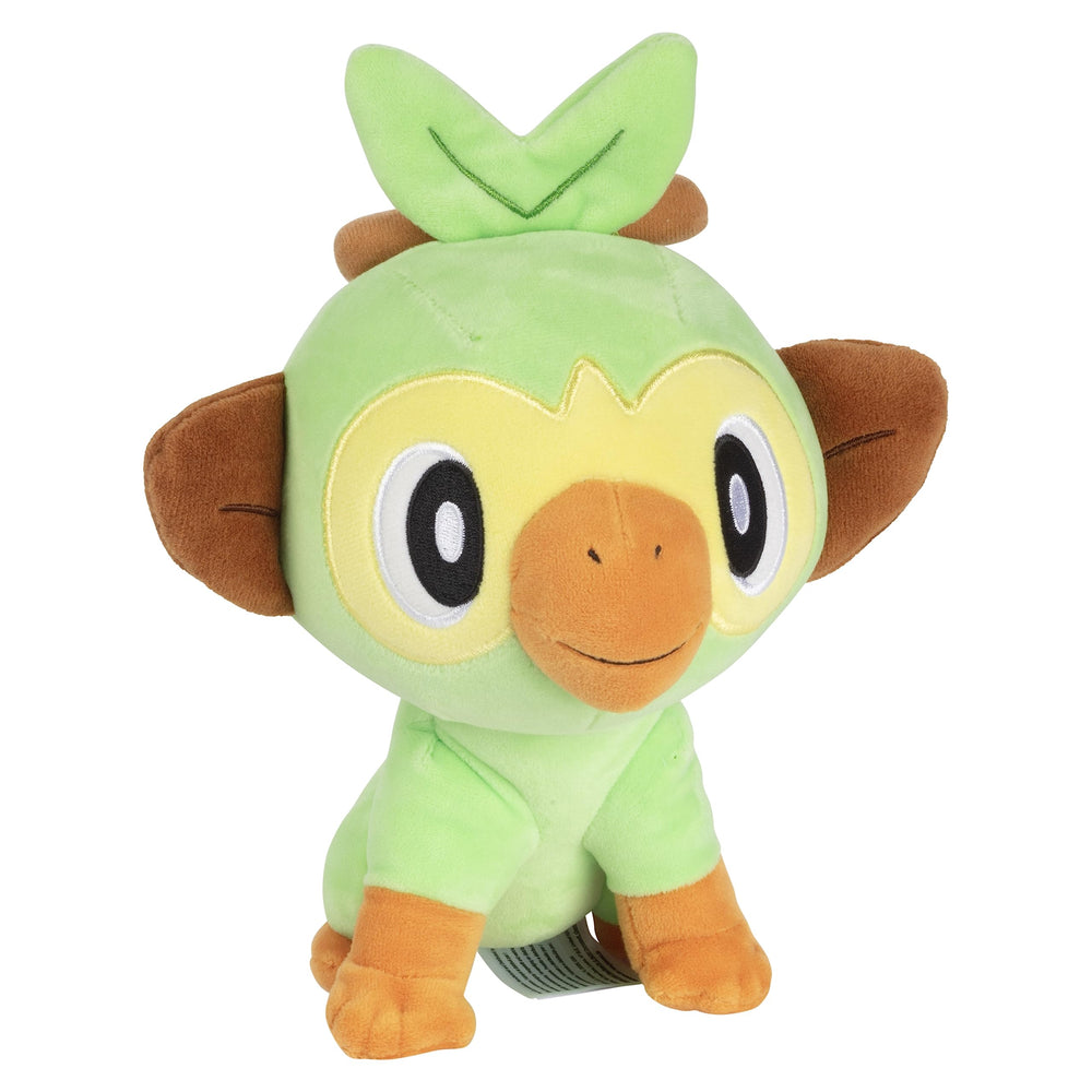 Jazwares Grookey plush face close-up highlighting eyes and details.