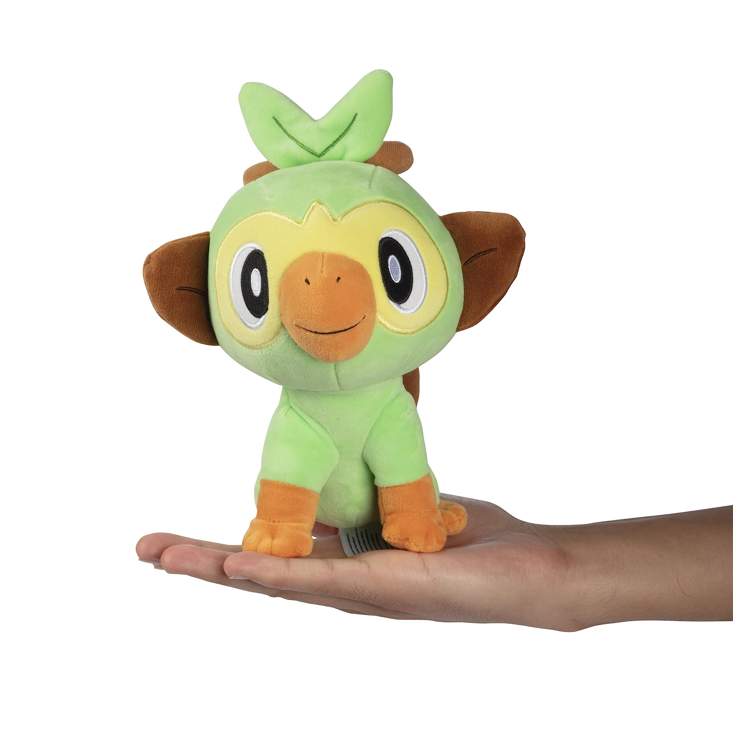 Jazwares Grookey plush in-hand, ideal travel companion for fans.