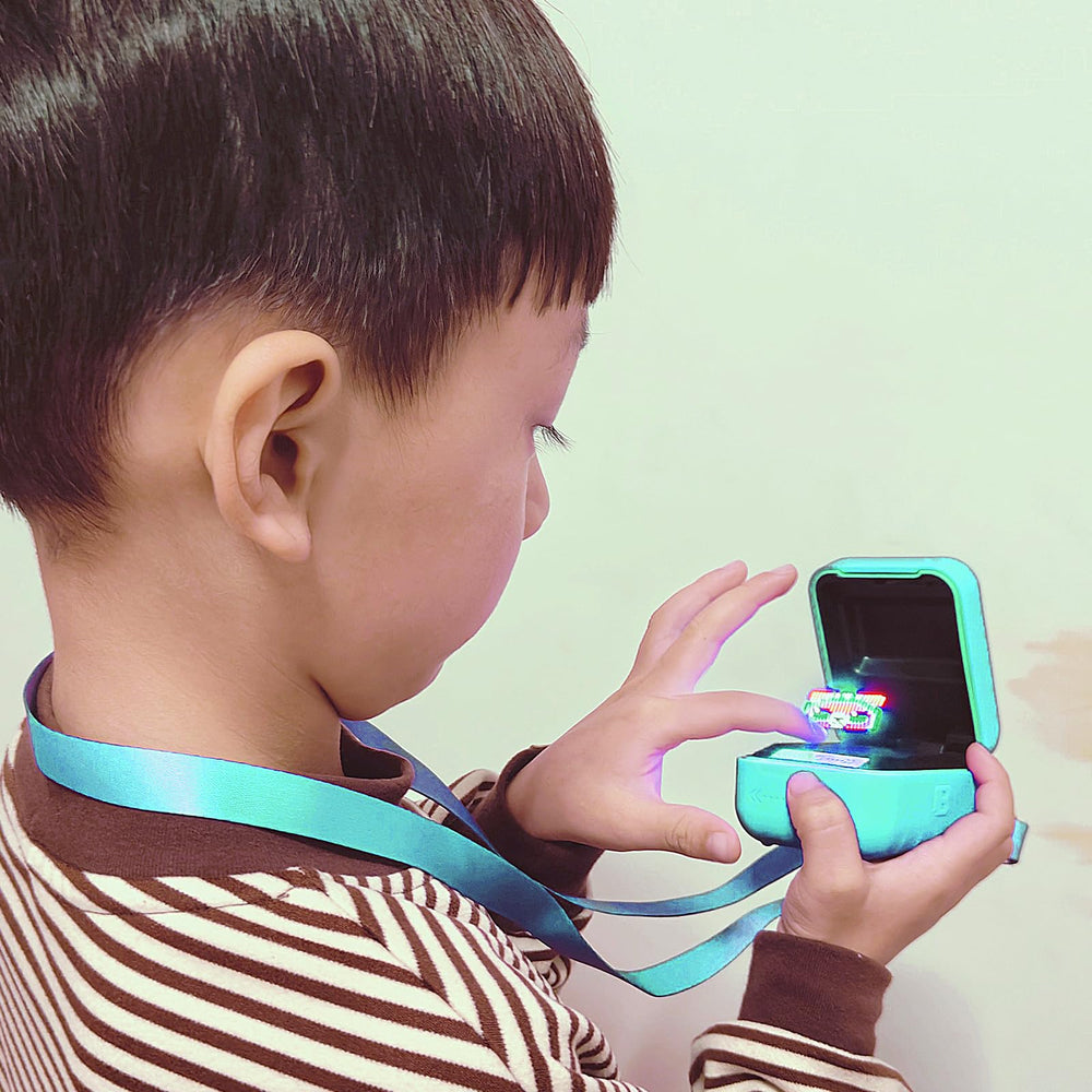 JCHPINE Bitzee teal silicone skin provides comfortable handling anywhere.