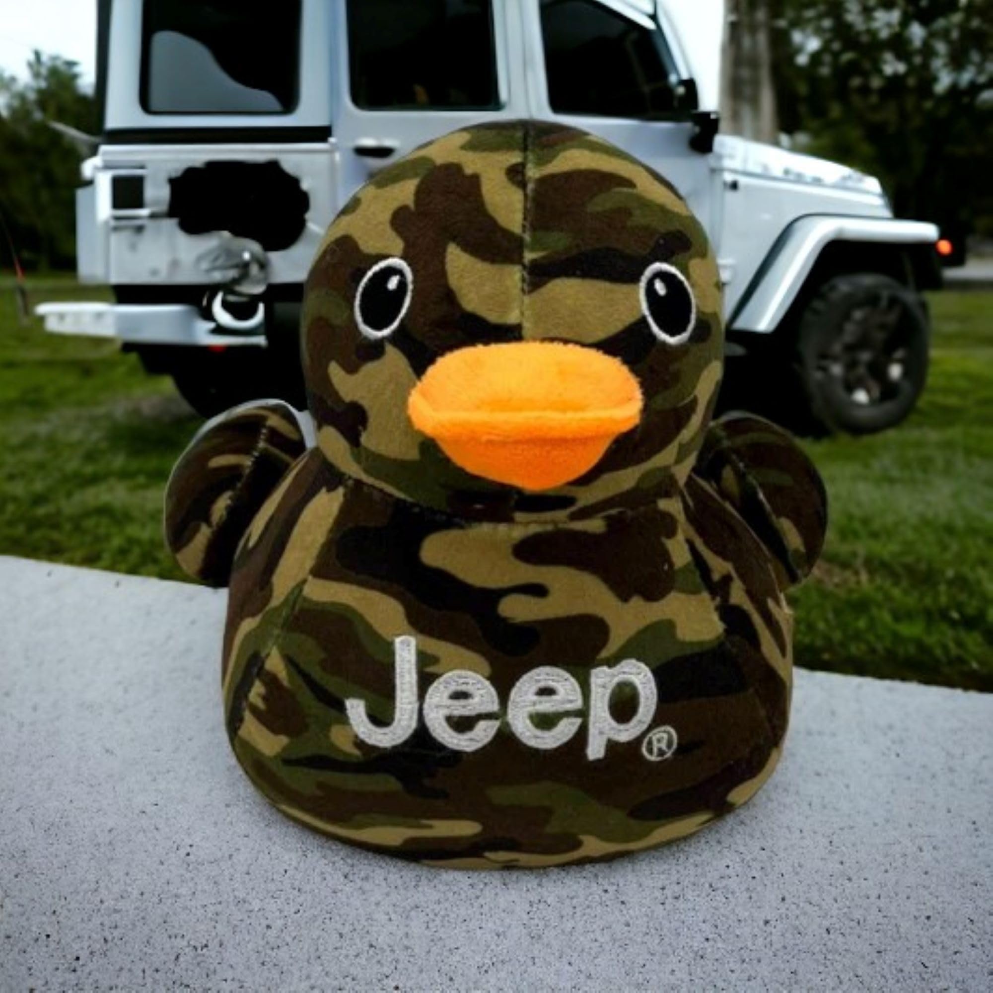 Jeep duck plush close-up with camo pattern for enthusiasts.