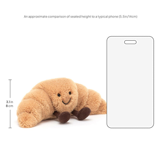Jellycat Amuseables Croissant plush side profile highlighting huggable shape