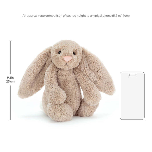 Close-up of Bashful Beige Bunny's long floppy ears and friendly expression.