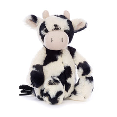 Jellycat Bashful Calf 12-inch plush ready for cuddle sessions.