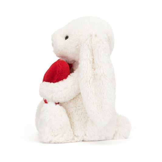Jellycat Bashful Red Love Heart Bunny holding a bright heart for affectionate gifting.