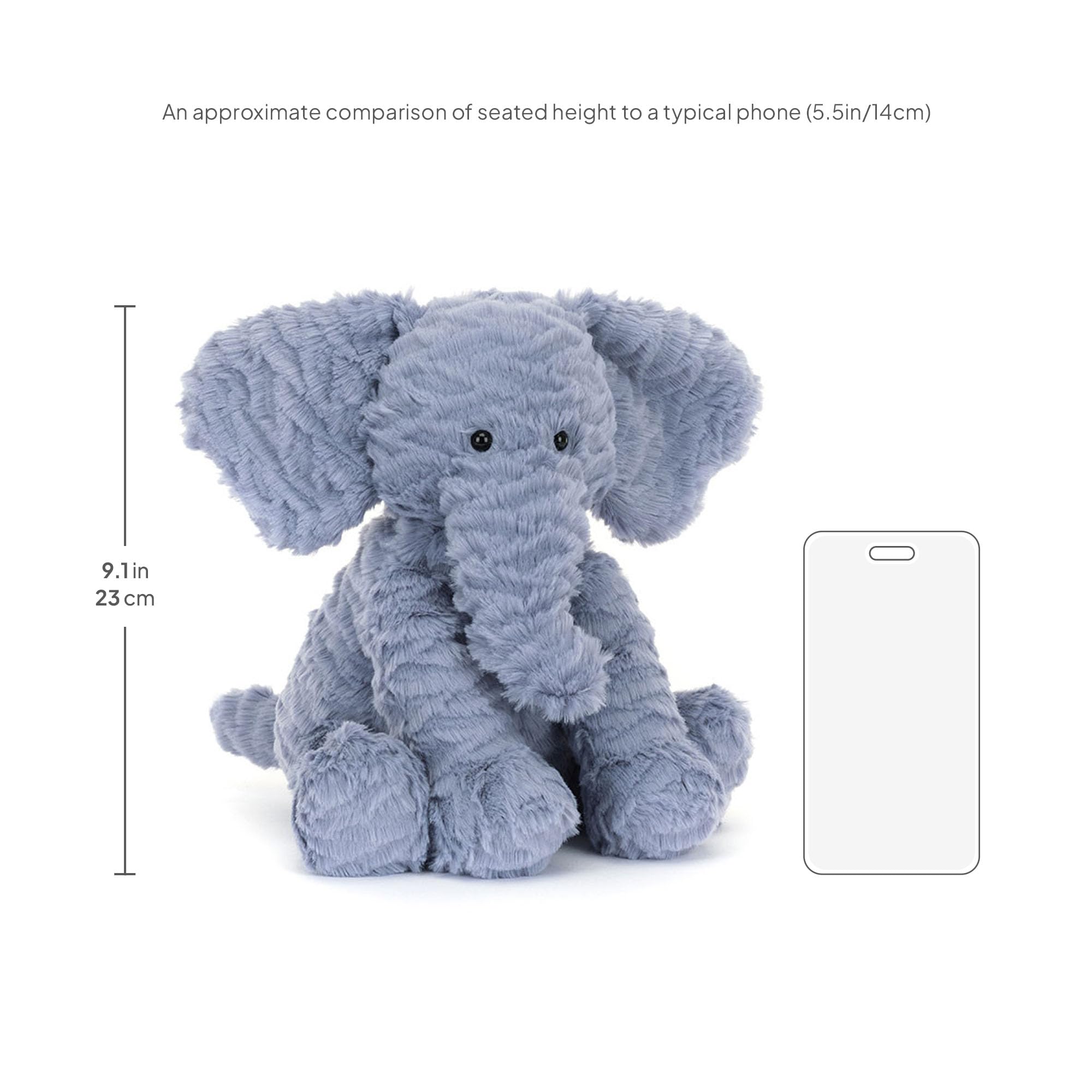 Jellycat Fuddlewuddle Elephant perched on bed or shelf as comforting decor