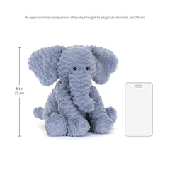 Jellycat Fuddlewuddle Elephant perched on bed or shelf as comforting decor