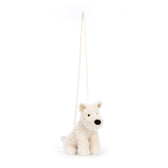 Jellycat Munro Scottie Dog Bag in use with phone and keys for everyday outings.