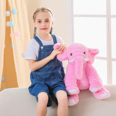 JellyMallow 16-inch weighted plush as a cozy pillow for lounging.