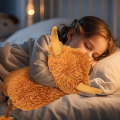 Bedtime buddy role for JellyMallow Highland Cow weighted plush on bed