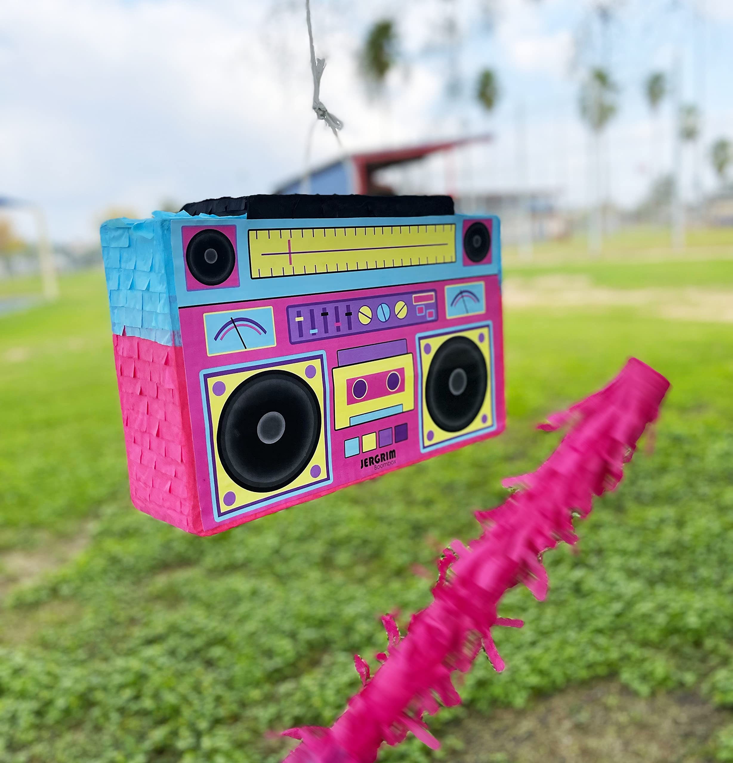 Colorful tissue paper and Jergrim boombox pinata decorate vibrant celebrations