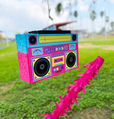 Colorful tissue paper and Jergrim boombox pinata decorate vibrant celebrations