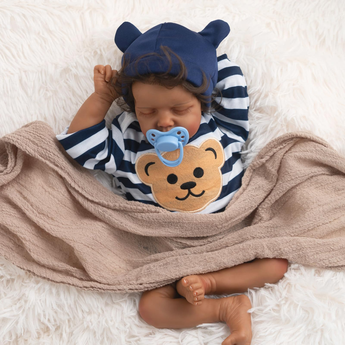 Jirachi black realistic baby doll boy 18inch, ready for nurturing play.