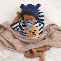 Jirachi black realistic baby doll boy 18inch, ready for nurturing play.