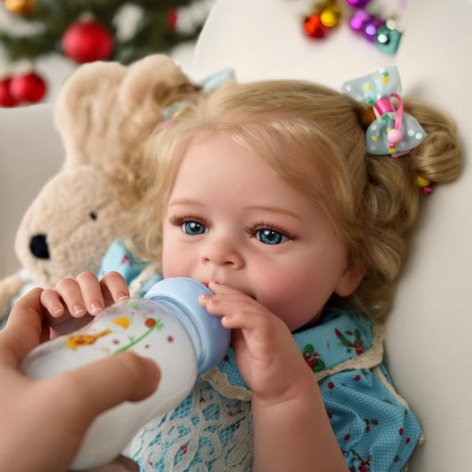 JIZHI reborn doll with blond hair—perfect for dress-up and styling.