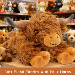 JOD Highland Cow long horns and shaggy coat add lifelike charm.