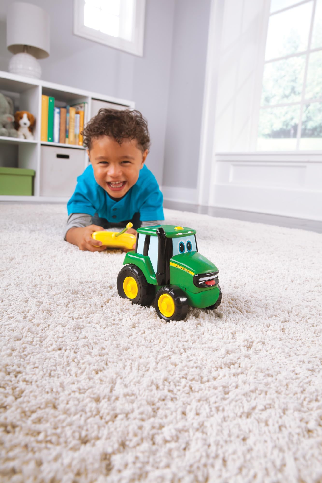 John Deere Johnny Tractor RC in toddler play pose with simple two button control