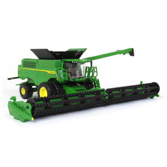 John Deere Prestige X9 1100 combine left side with dual front wheels.