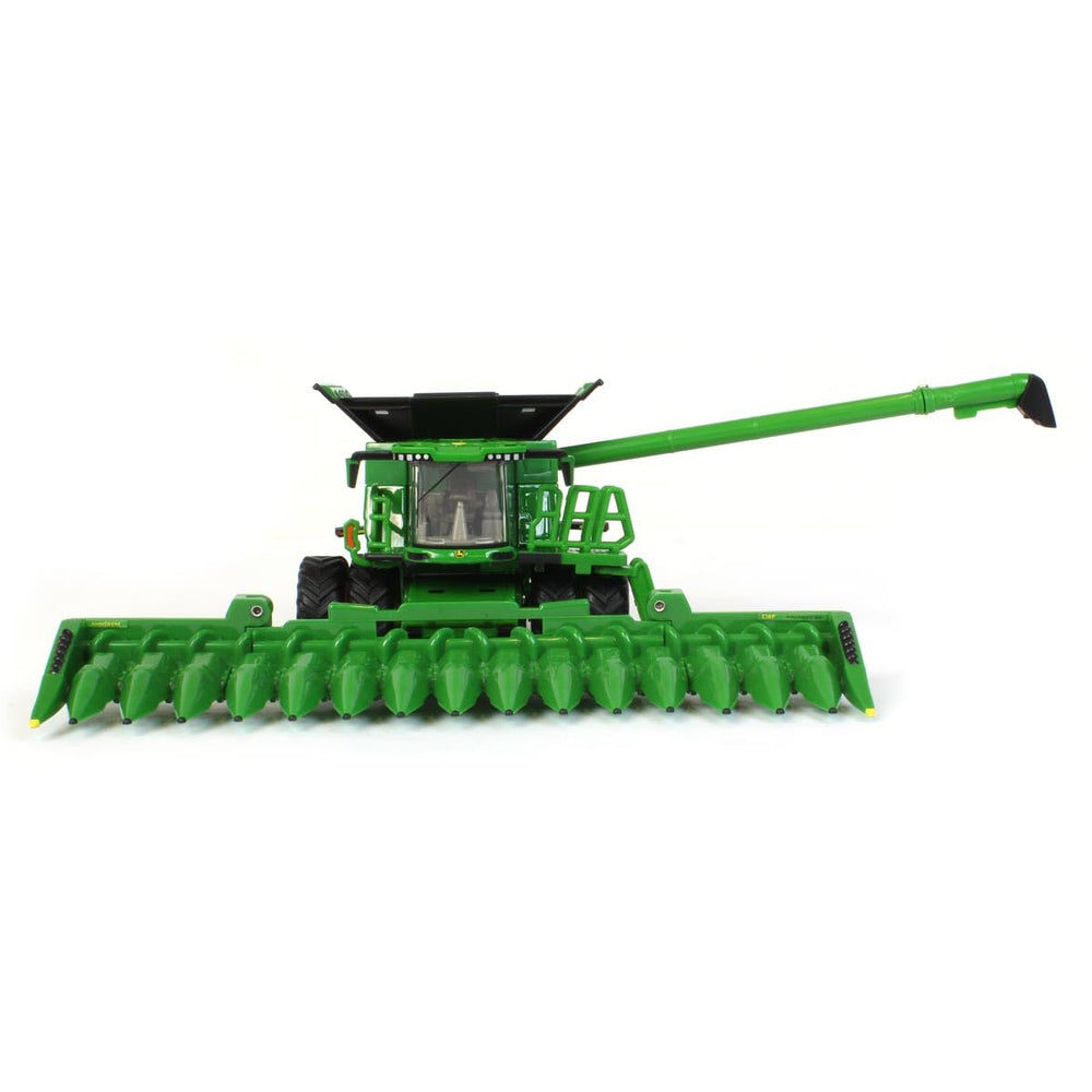 John Deere Prestige X9 1100 combine unloading auger in motion detail.