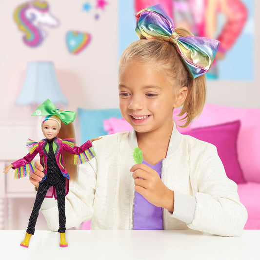 Close-up of JoJo Siwa's face with vibrant bow for expressive play.