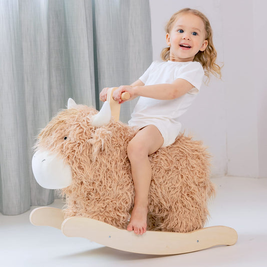 JOLIE VALLÉE TOYS wooden cow rocking horse for toddlers; inviting nursery play.