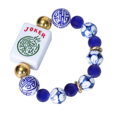 Jongyance blue Mahjong accessory with joker tile worn for casual style
