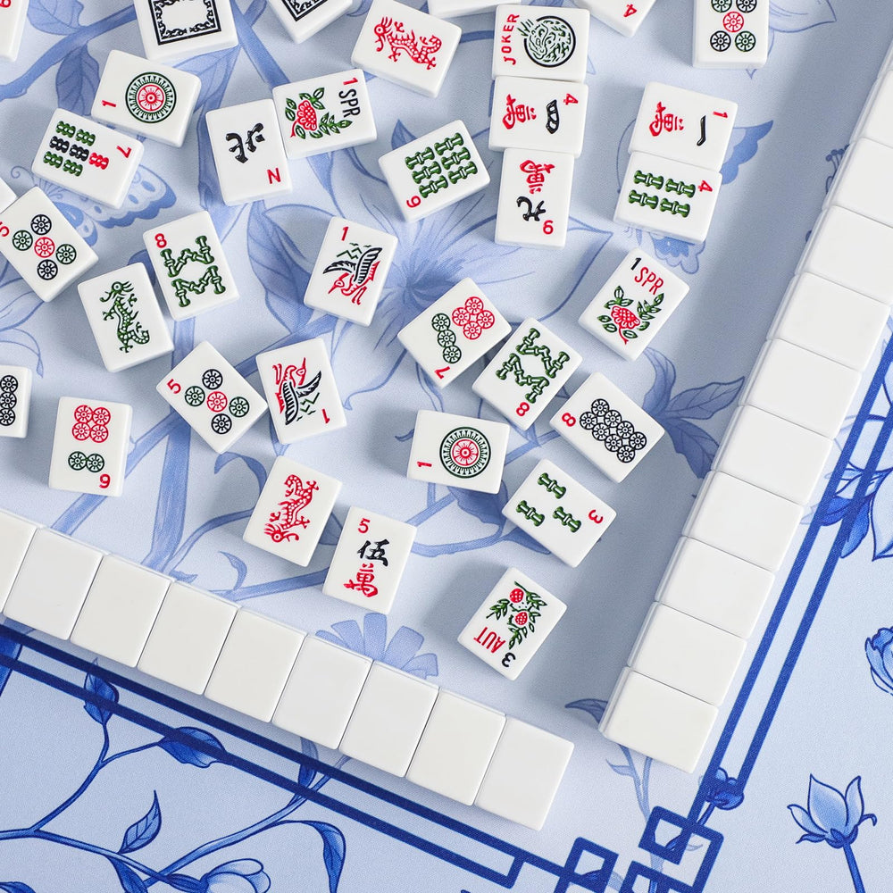 Jongyance mahjong mat with noise-reduction backing reduces table clatter