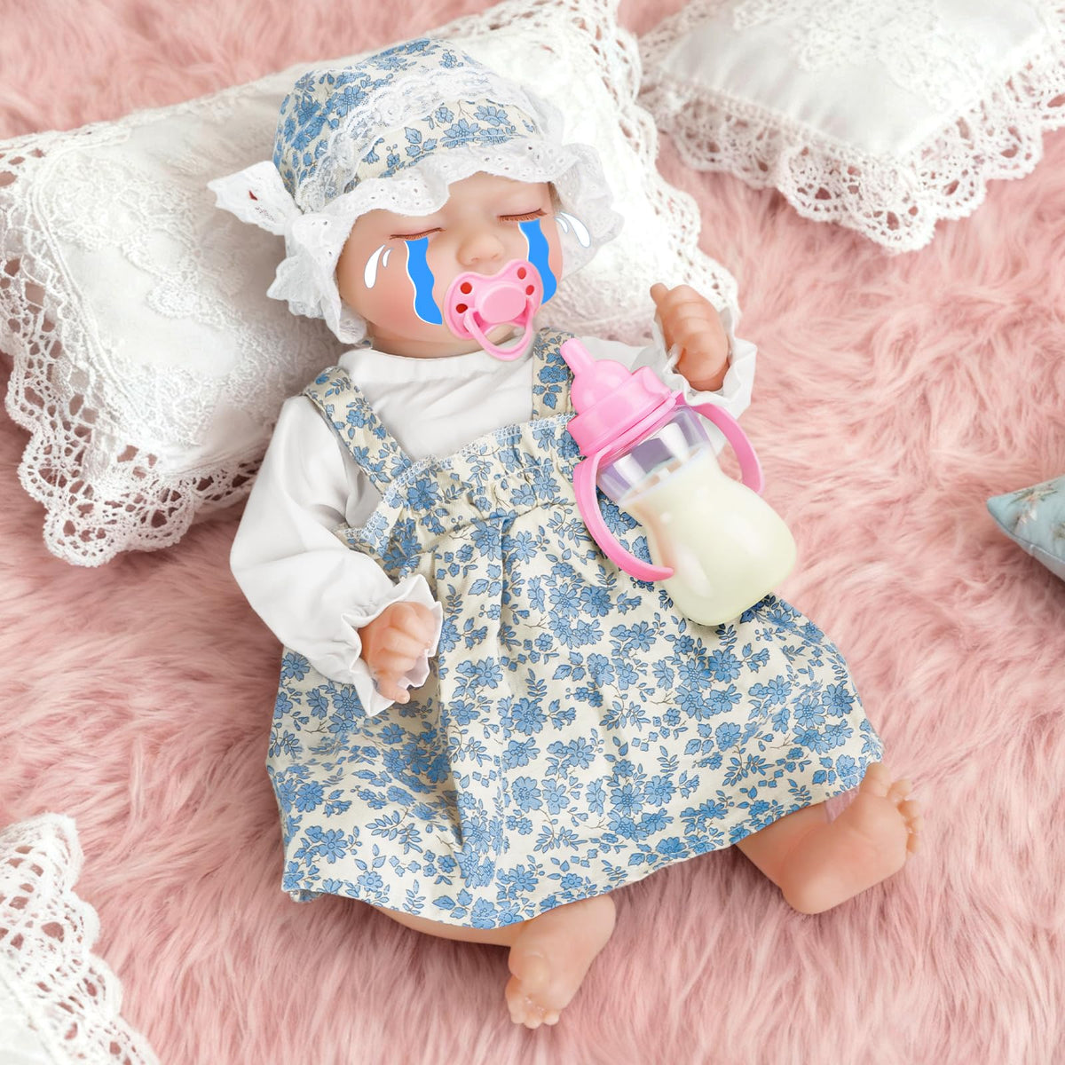 JONRRYIN Reborn baby doll in blue outfit offers lifelike realism for imaginative play.