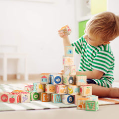 Blocks with letters and animals helping color and shape recognition during play.
