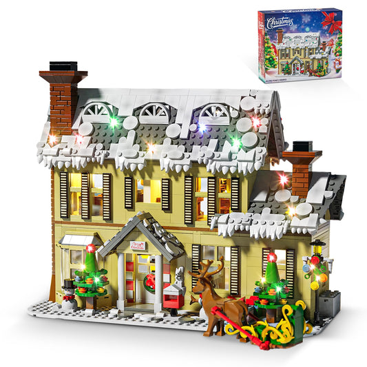JUALDN gingerbread house exterior with snow-covered roof and festive windows for holiday display