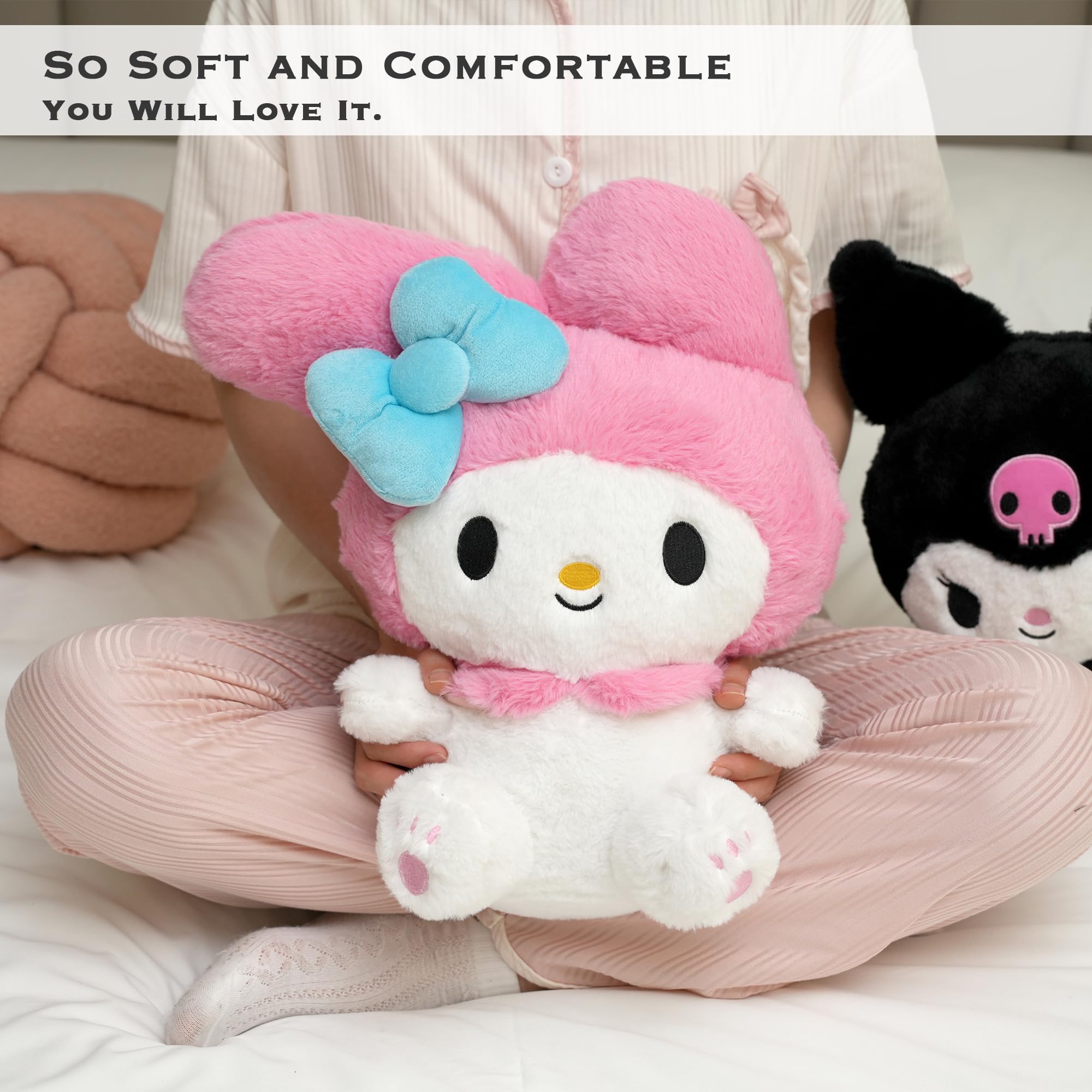 Juju Goods pink plush ears and face emphasize cute expression perfect for gifting.