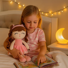 Jumbrace doll with child playing demonstrates imaginative role-play potential.
