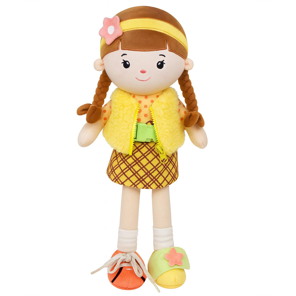 Jumbrace soft baby doll in yellow dress, front view, inviting cuddle